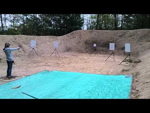 Kayla shooting Smoke and Hope with Dan Wesson PM9