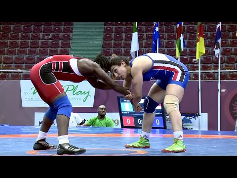 GOLD FW - 69 kg: H. RUEBEN (NGR) df. E. AHMED (EGY), 8-2