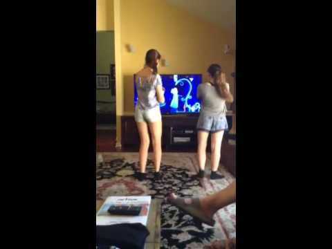 Two teens dancing two a baby song