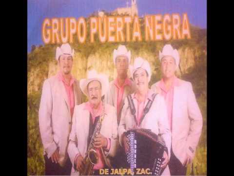 Grupo Puerta Negra - Una flor y un puño de tierra