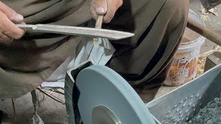 The process of making a blacksmith's knife on the back of an old file
