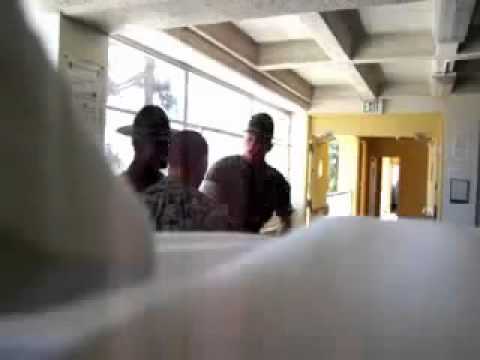 Marine Drill Sergeants yelling at recruit