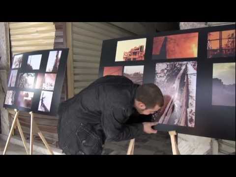 تنظيم معرض للتصوير الفوتوغرافي بعنوان "مدينتي حرة" في مدينة دوما في ريف دمشق بمناسبة الذكرى السنوية الثانية للثورة السورية