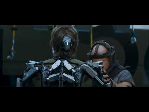 Elysium Agent Kruger Suiting up exoskeleton scene