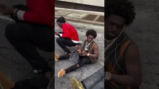 #kodakblack seen eating fried chicken in the middle of the road