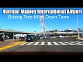 Driving from tree miles  down town norman manley international airport