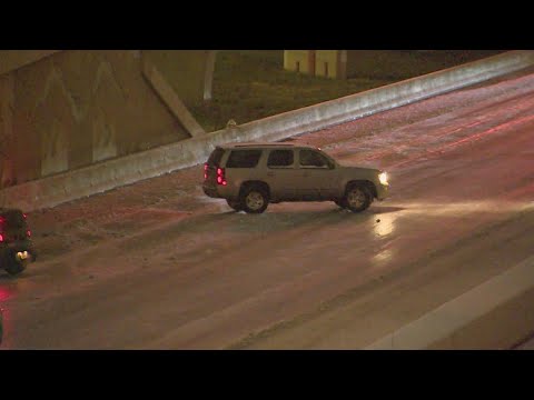 Be careful! Cars sliding on ice on U.S. 75 in Dallas