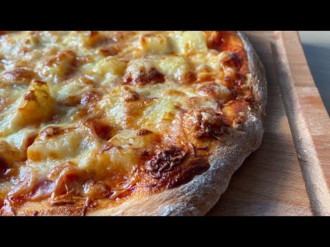 Hawaiian Pizza with Ham, Pineapple, and Cheese