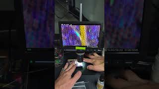 Checking out the damage under the micro scope #pokemon #pokemoncards #pokemonteam