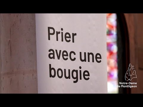 Déposer une bougie aux pieds de Notre-Dame de Montligeon