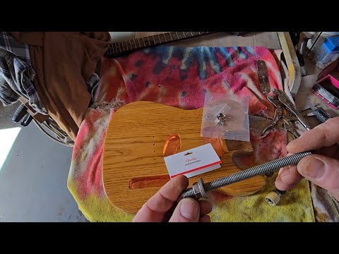 Guitar repair. How to install a fender jack plate and cup assembley in your telecaster. diy tool