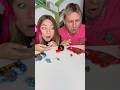 Boy got very spicy gummy bears while girl got blue chocolate balls 😇😜