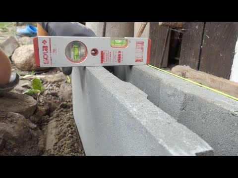 Installing strip foundations and formwork blocks, step by step