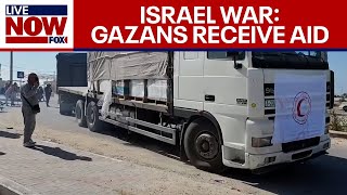 Israel War latest: Aid convoys enter Gaza amid Isr