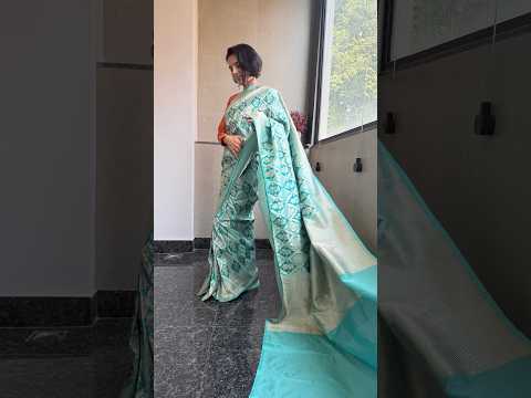 Aqua Floral Saree with Broad Shimmering Border and Pallu