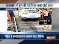Man drives car on railway track in Rajasthan