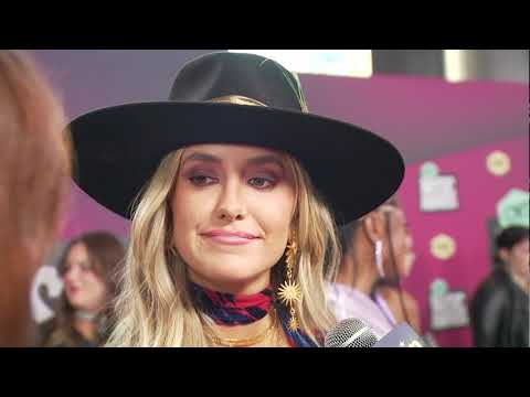CMT Awards 2023: Lainey Wilson on aqua carpet | FOX 7 Austin