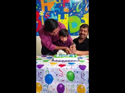 Rishik cutting his 1st birthday cake