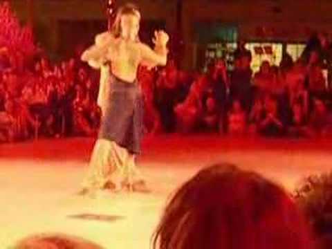  Andrea Misse  and  Javier Rodriguez  are  dancing  to  the  tango  "  Negracha  "