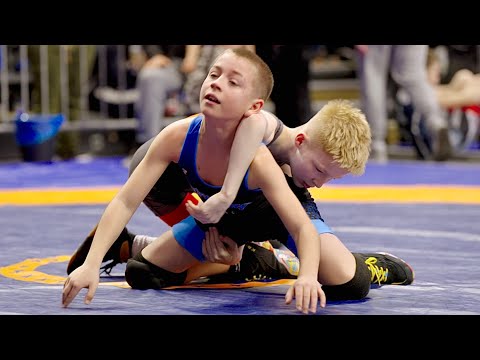 U13 Lenn Schenk (GER) vs Lukass Zikars (LAT) 35kg. Freestyle boys youth wrestling. B-cam-man