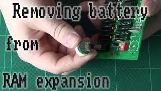 Removing battery from Amiga RAM expansion.