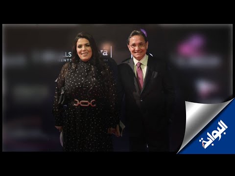 لحظة وصول عبد الرحيم علي وحرمه إلى حفل ختام مهرجان القاهرة السينمائي