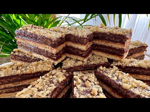 Festive cake with walnuts, coconut flakes and chocolate cream - a dream dessert