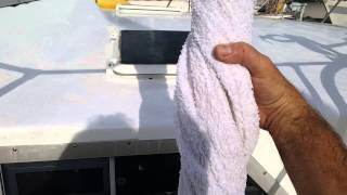 How to hand wring larger laundry items.