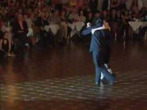  Katia Rodrigues  and  Alexandre Bellarosa  are  dancing  to  the  milonga  "  Flor de Monserrat  "