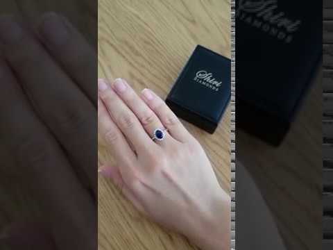 A video of Diana Royal Blue Sapphire & Diamond Halo Cluster Ring in 14k Gold