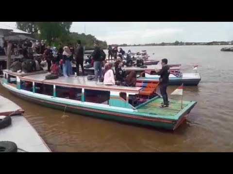 Usai Menerima Materi Kuliah Dari Wali Kota, Mahasiswa ULM Banjarmasin Lakukan Kegiatan Ini di Sungai