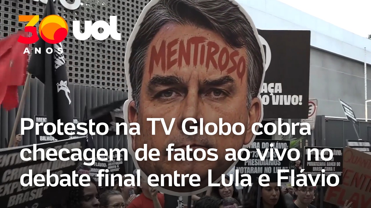  Manifestantes pedem checagem de fatos ao vivo no debate na Globo entre Lula e Flávio Bolsonaro