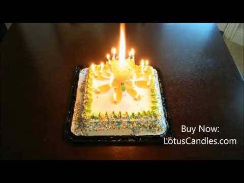 Red Lotus Candle™ on White Cake