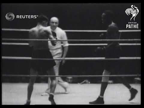 BOXING: Bantamweight champion Al Brown defends his boxing title at Geneva (1934)