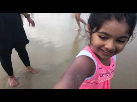 Zara and Zuhair playing at Belmar beach