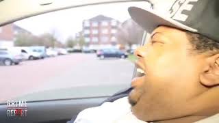 Black fat guy laughs in the car meme