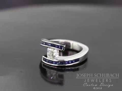 DG's Tension set engagement ring with channel set sapphires