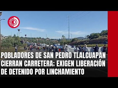 Pobladores de San Pedro Tlalcuapan cierran carretera; exigen liberación de detenido por linchamiento