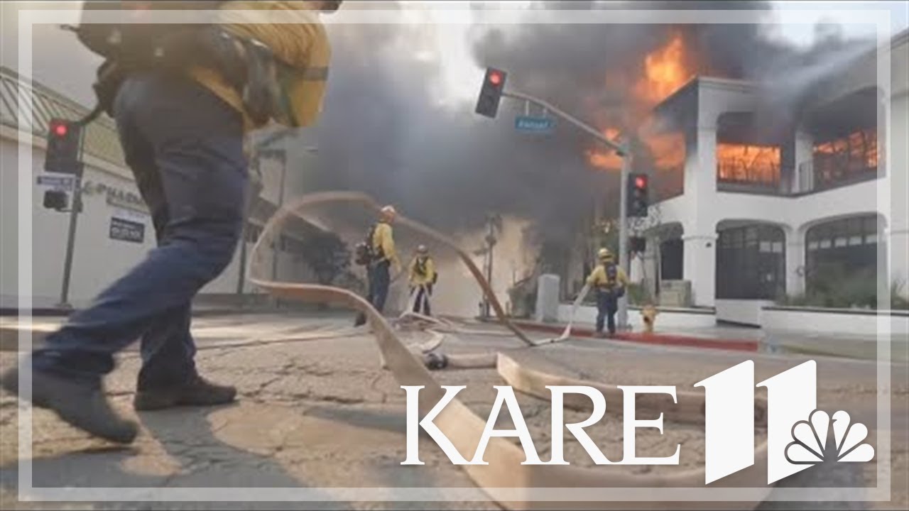 Winds die down as fires rage across Los Angeles area