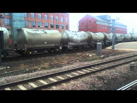 A Freightliner Class 66, 66523 passes through Newcastle.