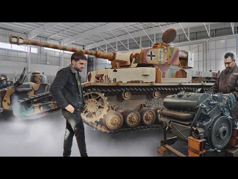 They are restoring extremely rare tanks in the workshop of the Musée des Blindés