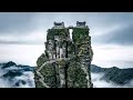 TEMPLE BUILD HIGH ABOVE THE CLOUDS FANJINGSHAN MOUNTAIN IN CHINA