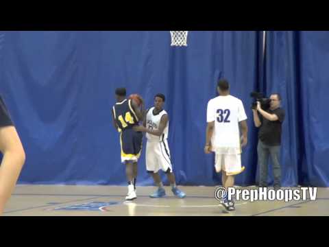 Michigan Wolverine commit Derrick Walton Jr gets up for a dunk at the Michigan Classic