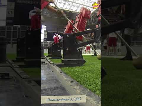 Arizona Cardinals outside linebacker Chandler Jones separates blocking dummy's body from sled
