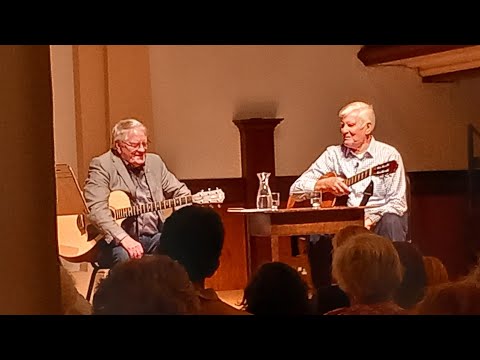 Dafydd Iwan talking and singing with Edward Morus Monday 21st August 2023..Machynlleth Cymru (Wales)