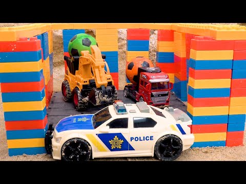 Bibo plays with trucks and excavators along with a prison made of colorful blocks | BIBO TOYS