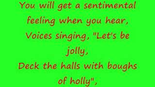 Miley Cyrus- Rockin around the christmas tree | with lyrics on Screen [HQ]