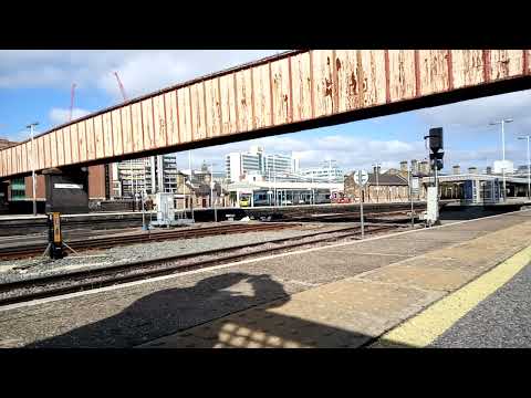 TPE class 68s with 2 tone passing Sheffield with thrash