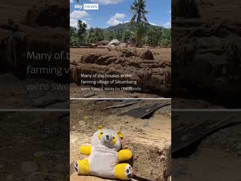 Indonesia floods: Husband searches for missing family