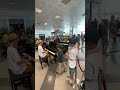 SHAUN ODELL - PLAYING IN ROME AIRPORT